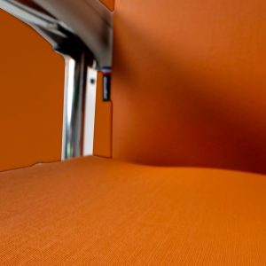 fauteuil médical de transfert monobloc et inclinable Vesta orange Navailles